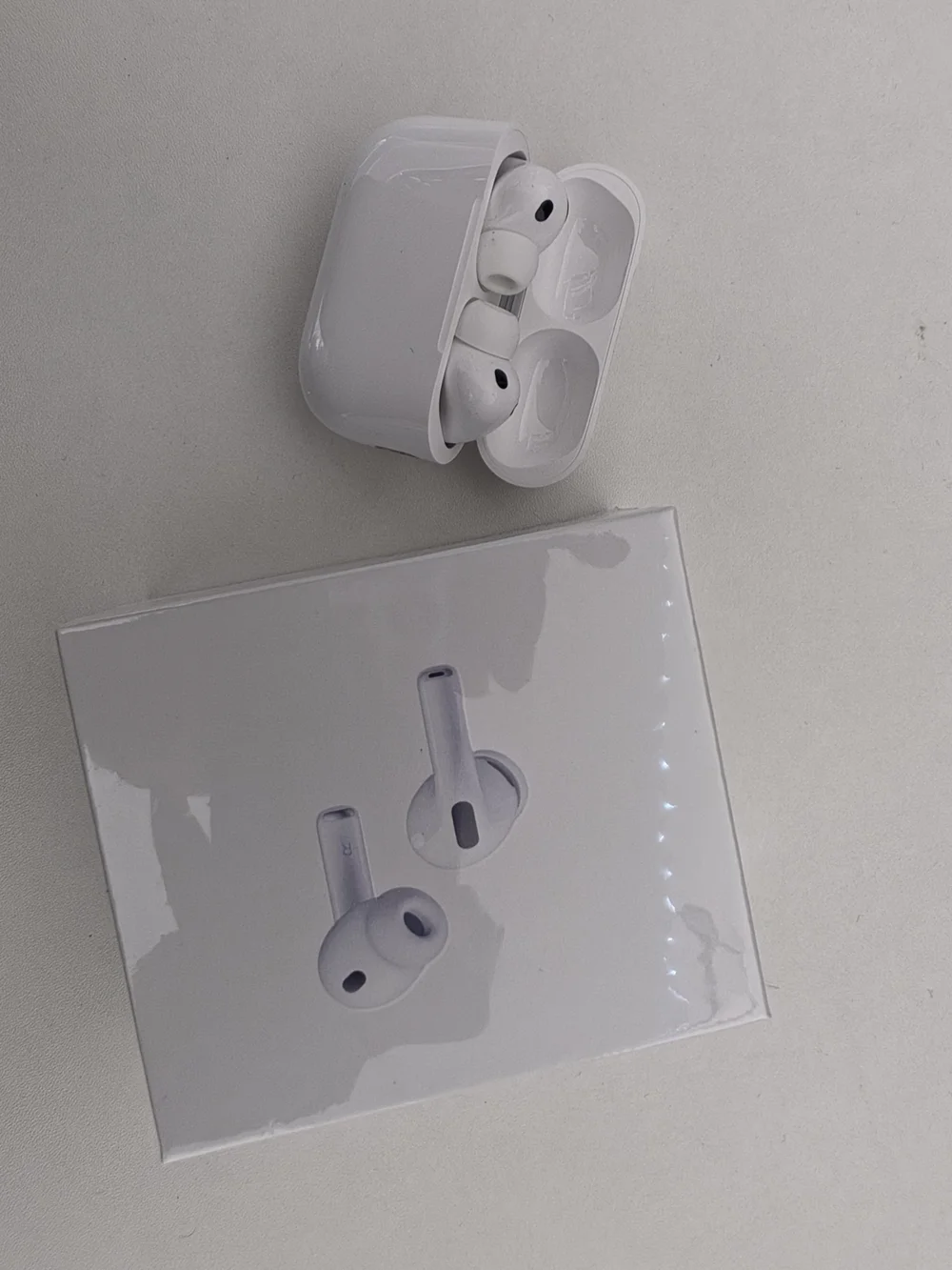 Apple Wireless Earbuds and Charging Case in White